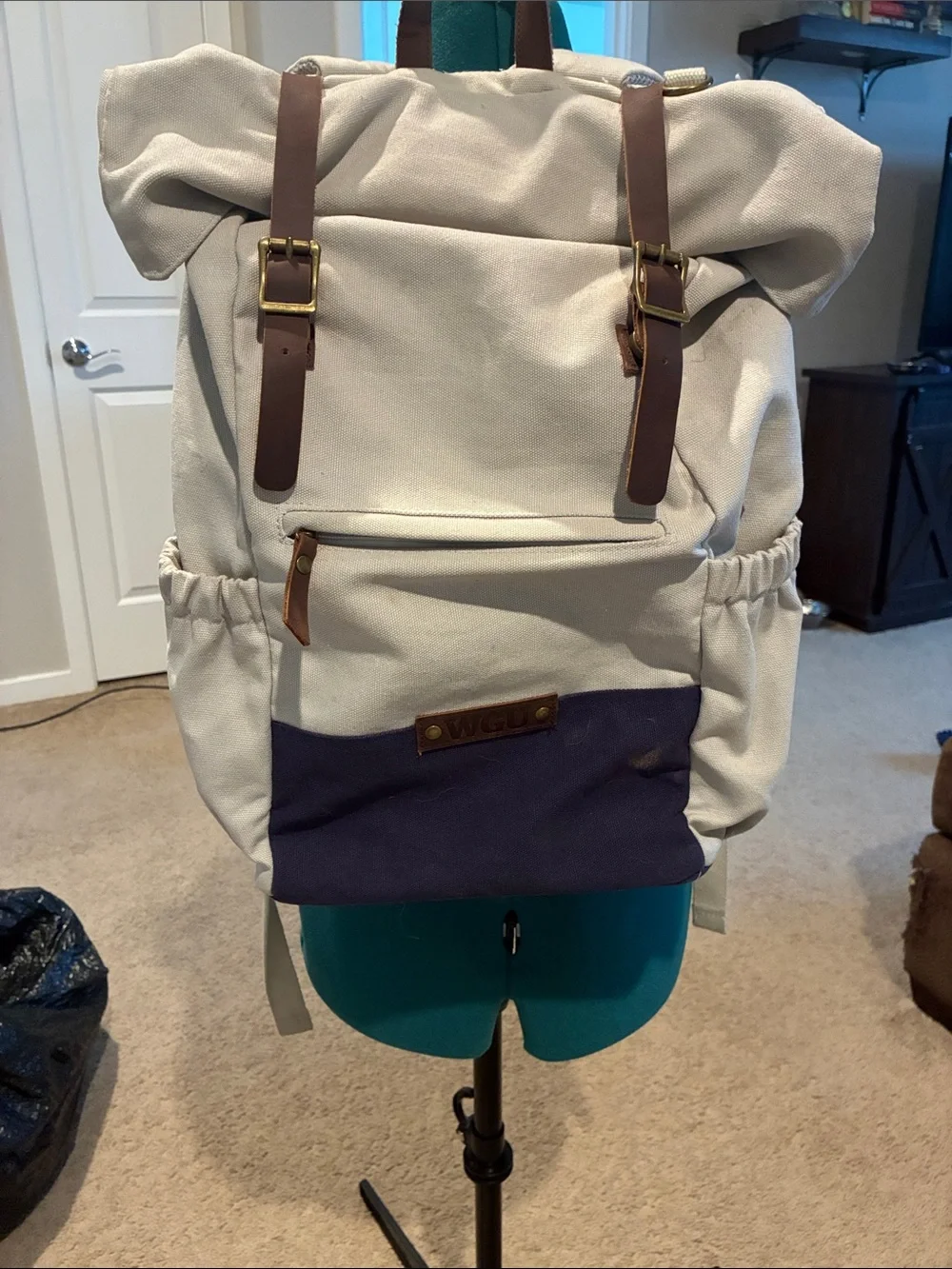 Canvas Roll-Top Backpack with Brown Leather Straps and Navy Pocket